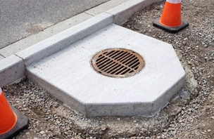 Underground drainage pipe connected to a catch basin